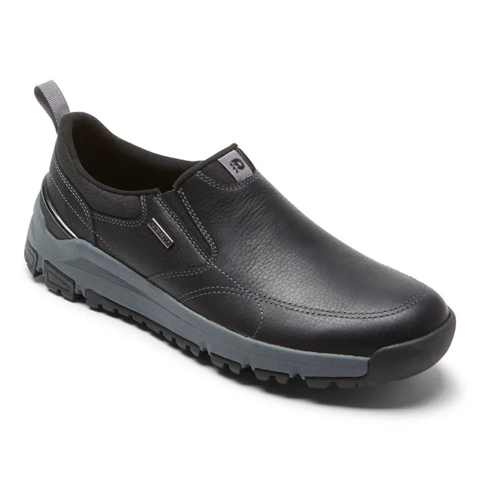 Men's loafers with a contrast stitching detailMens Dunham Glastonbury Slip-On in Black