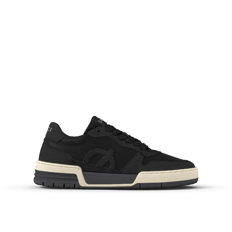 Men's black canvas sneakers with a red soleATOM