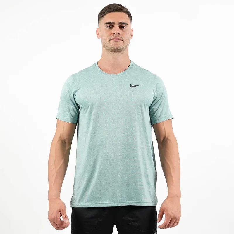 Men's vegan leather sneakers for an eco - friendly optionNike Pro Dri - Fit short sleeve T- shirt Light Green