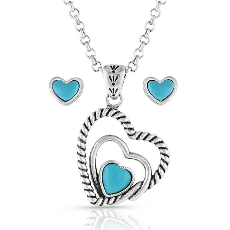 Men's western boots with a leather sole and a heel guardMontana Silversmiths Clearer Ponds Turquoise Heart Jewelry Set