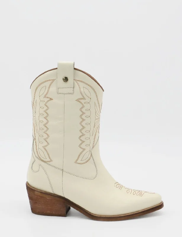 Western - style men's boots with intricate tooling and stitchingUnstoppable western cowboy boot off white leather womens shoes